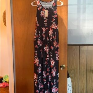 2 long dresses. I pants suit. Never worn